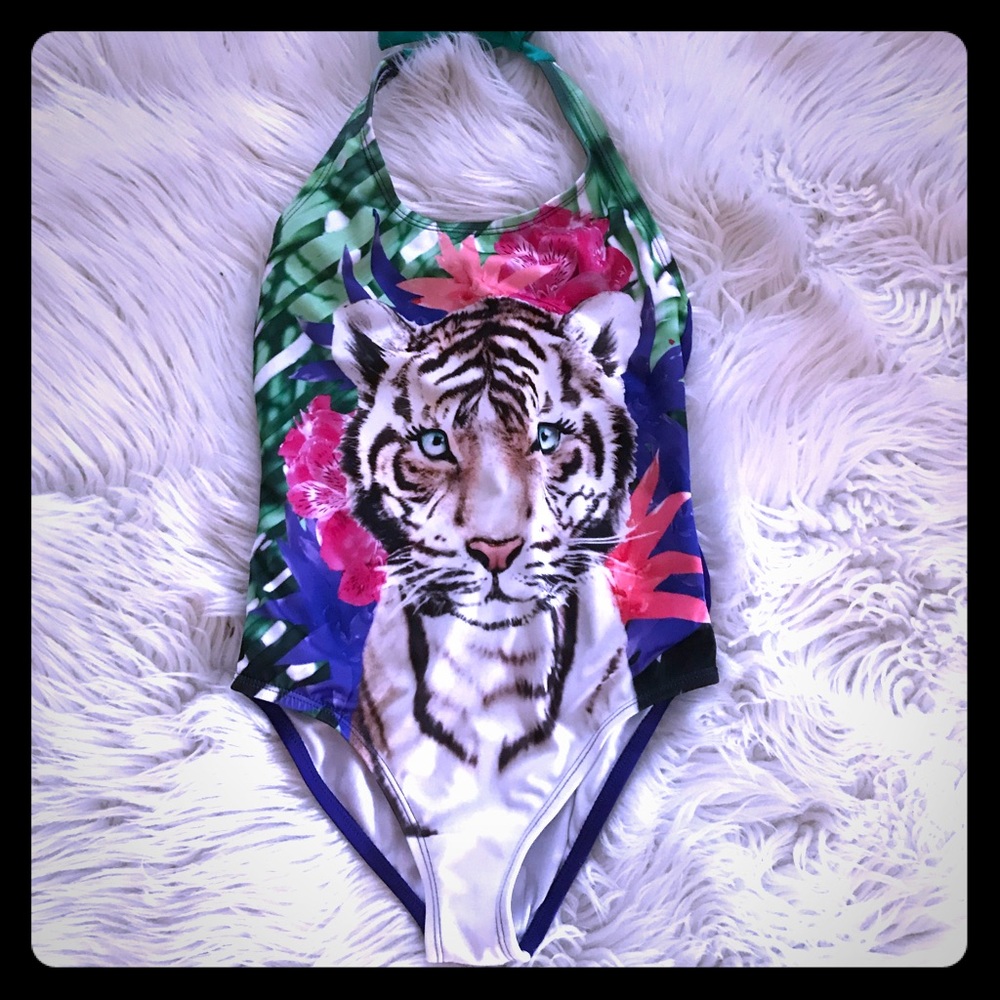 Like new one piece Tiger swimsuit. Size 7/8.